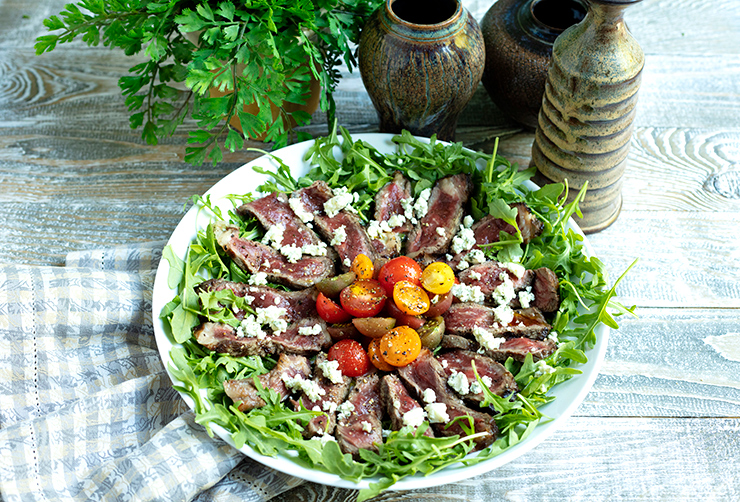 Tuscan Beef Tagliata With Arugula, Tomatoes, & Gorgonzola Crumbles